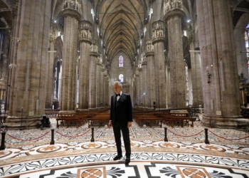 Italian opera singer Andrea Bocelli prepares for the ''Music for hope'' event, a streamed live performance intended as a symbol of love, hope and healing amidst the coronavirus disease (COVID-19) outbreak, on Easter Sunday, at an empty Duomo Cathedral in Milan, Italy, April 12, 2020. Luca Rossetti/Courtesy Sugar Srl/Decca Records/Handout via REUTERS  THIS IMAGE HAS BEEN SUPPLIED BY A THIRD PARTY. MANDATORY CREDIT. NO RESALES. NO NEW USAGE USE AFTER 23:59 GMT ON DECEMBER 31, 2020. IMAGE MUST BE USED IN ITS ENTIRETY - NO CROPPING OR OTHER MODIFICATIONS.